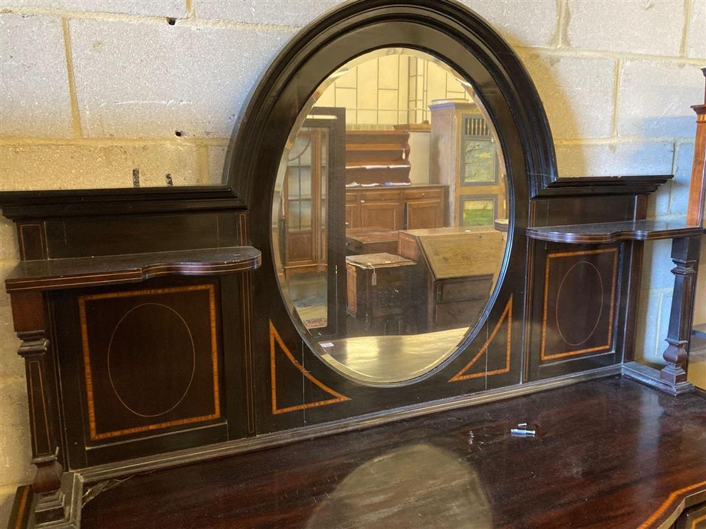 An Edwardian satinwood banded mahogany sideboard, with mirrored superstructure, width 169cm